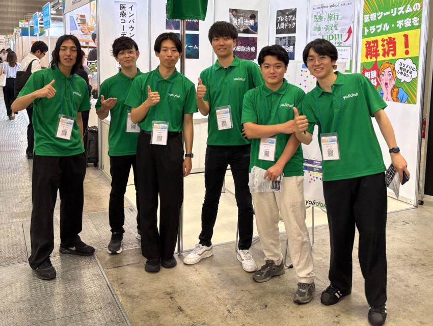 yolidoli team members at an exhibition booth